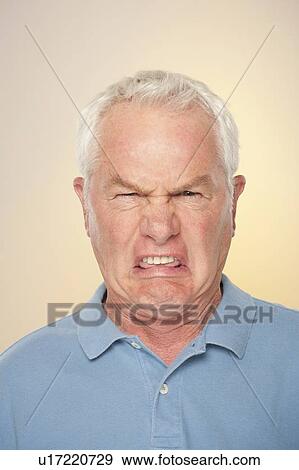 Portrait of senior man with disgusted face expression View Large Photo Image Stock Photo - Portrait of senior man with disgusted face expression. Fotosearch