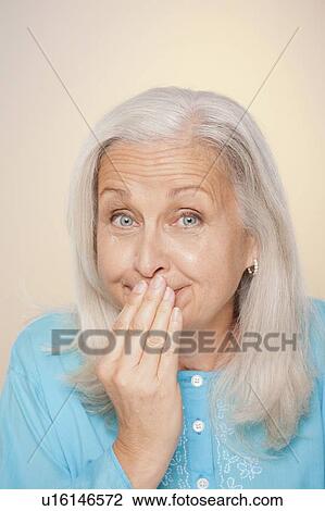 Stock Image - Portrait of senior woman. Fotosearch