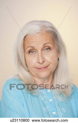 Stock Image - Portrait of senior woman. Fotosearch