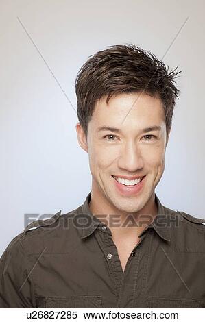 Stock Photography - Portrait of smiling man. Fotosearch
