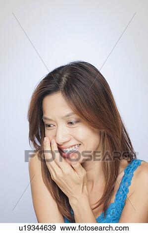Portrait of smiling woman View Large Photo Image Stock Photo - Portrait of smiling woman. Fotosearch