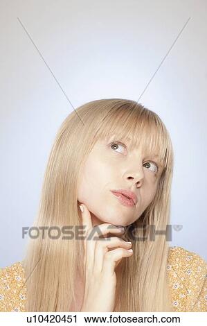 Portrait of woman day dreaming View Large Photo Image Stock Image - Portrait of woman day dreaming. Fotosearch