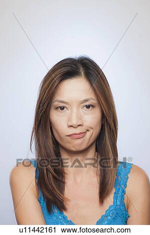 Portrait of woman sulking View Large Photo Image Stock Image - Portrait of woman sulking. Fotosearch