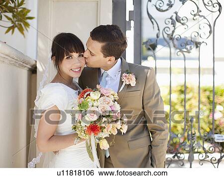 Portrait of young bride and groom View Large Photo Image Stock Photograph - Portrait of young bride and groom. Fotosearch