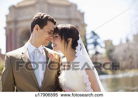 Portrait of young bride and groom View Large Photo Image Stock Photography - Portrait of young bride and groom. Fotosearch