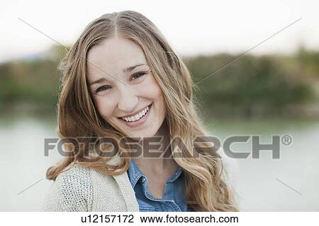 Portrait of young woman View Large Photo Image Stock Image - Portrait of young woman. Fotosearch