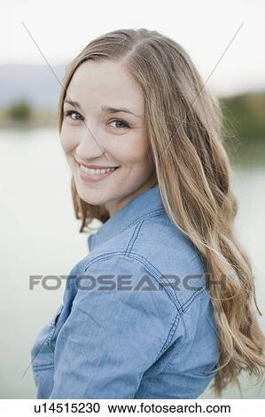 Stock Image - Portrait of young woman. Fotosearch