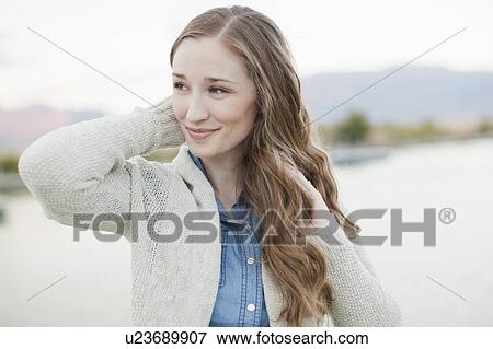Portrait of young woman View Large Photo Image Stock Photo - Portrait of young woman. Fotosearch