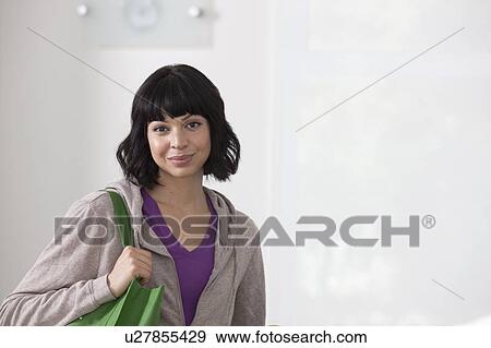 Stock Photo - Portrait of young woman. Fotosearch