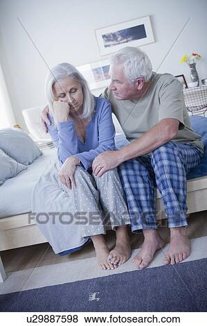 Stock Photo - Senior couple after quarrel. Fotosearch
