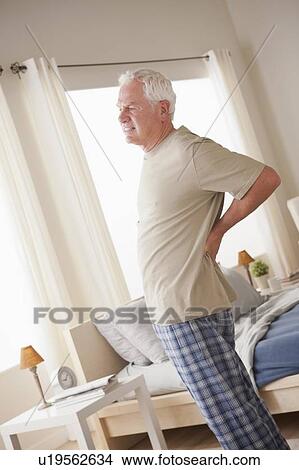Senior man having backpain View Large Photo Image Picture - Senior man having backpain. Fotosearch