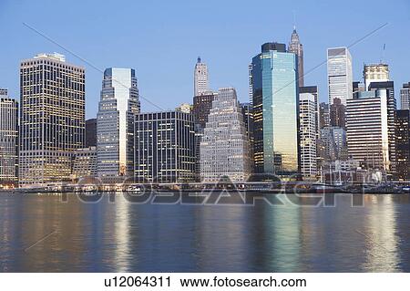 Stock Image - Skyline at sunset. Fotosearch