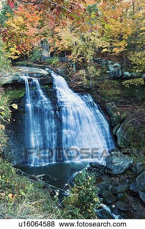 Small waterfalls in forest View Large Photo Image Stock Photo - Small waterfalls in forest. Fotosearch