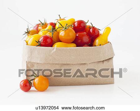 Studio Shot of Cherry Tomatoes in paper bag View Large Photo Image Picture - Studio Shot of Cherry Tomatoes in paper bag. Fotosearch