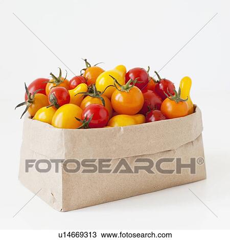 Studio Shot of Cherry Tomatoes in paper bag View Large Photo Image Stock Image - Studio Shot of Cherry Tomatoes in paper bag. Fotosearch