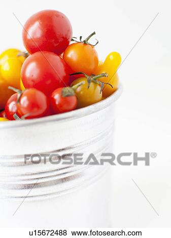 Studio Shot of Cherry Tomatoes in plastic container View Large Photo Image Stock Photo - Studio Shot of Cherry Tomatoes in plastic container. Fotosearch