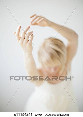 Studio Shot of dancing woman View Large Photo Image Stock Image - Studio Shot of dancing woman. Fotosearch