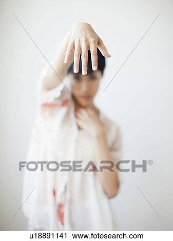 Studio Shot of dancing woman View Large Photo Image Stock Image - Studio Shot of dancing woman. Fotosearch