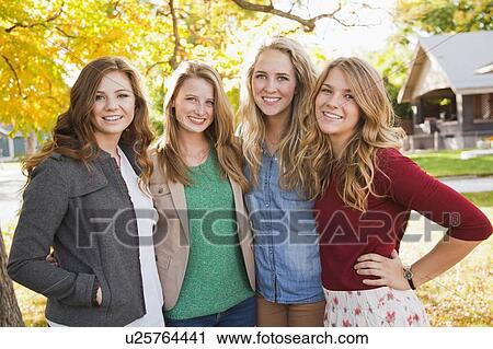 Waist up portrait of four friends View Large Photo Image Stock Image - Waist up portrait of four friends. Fotosearch