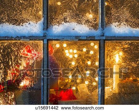 Stock Image - Window with Christmas lights. Fotosearch