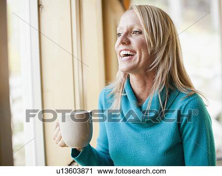 Woman drinking coffee View Large Photo Image Stock Image - Woman drinking coffee. Fotosearch