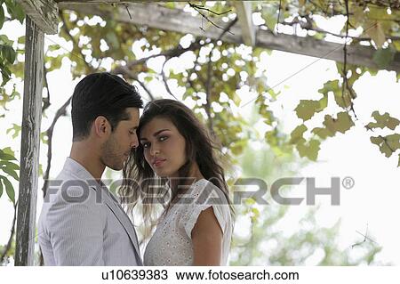 Young couple dating in vineyard View Large Photo Image Stock Image - Young couple dating in vineyard. Fotosearch