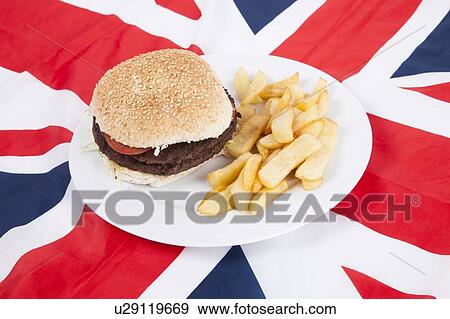 Close-up of hamburger and chips over British flag View Large Photo Image Stock Photo - Close-up of hamburger and chips over British flag. Fotosearch