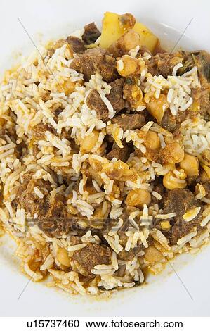 Close-up of rice and meat in plate View Large Photo Image Stock Image - Close-up of rice and meat in plate. Fotosearch