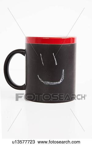 Close-up of smiley drawn on cup over white background View Large Photo Image Stock Image - Close-up of smiley drawn on cup over white background. Fotosearch