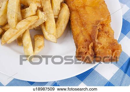 Detail shot of fries and meat on table View Large Photo Image Stock Photo - Detail shot of fries and meat on table. Fotosearch