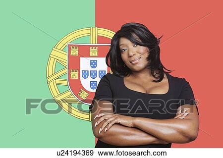 Portrait of casual mixed race woman against Portuguese flag View Large Photo Image Stock Photo - Portrait of casual mixed race woman against Portuguese flag. Fotosearch