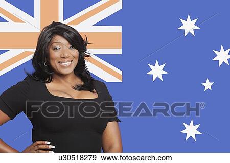 Portrait of casual mixed race woman against Australian flag View Large Photo Image Stock Photo - Portrait of casual mixed race woman against Australian flag. Fotosearch