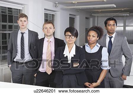 Portrait of confident young multiethnic business group at office View Large Photo Image Stock Image - Portrait of confident young multiethnic business group at office. Fotosearch