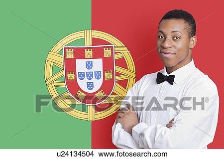 Portrait of mixed race man against Indian flag View Large Photo Image Picture - Portrait of mixed race man against Indian flag. Fotosearch
