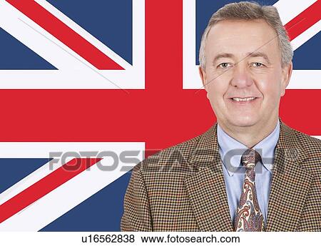 Portrait of smiling middle-aged businessman over British flag View Large Photo Image Stock Photo - Portrait of smiling middle-aged businessman over British flag. Fotosearch
