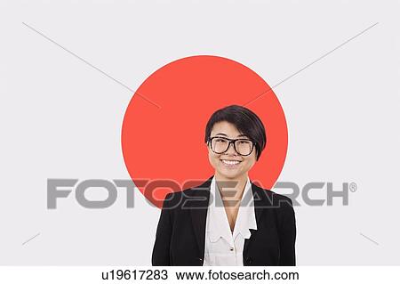 Portrait of young businesswoman smiling over Japanese flag View Large Photo Image Stock Image - Portrait of young businesswoman smiling over Japanese flag. Fotosearch
