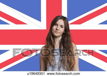 Portrait of young woman against British flag View Large Photo Image Stock Image - Portrait of young woman against British flag. Fotosearch