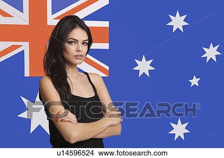 Portrait of young woman against Australian flag View Large Photo Image Picture - Portrait of young woman against Australian flag. Fotosearch