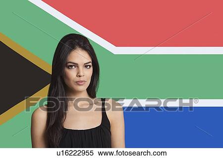 Portrait of young woman against South African flag View Large Photo Image Stock Photography - Portrait of young woman against South African flag. Fotosearch