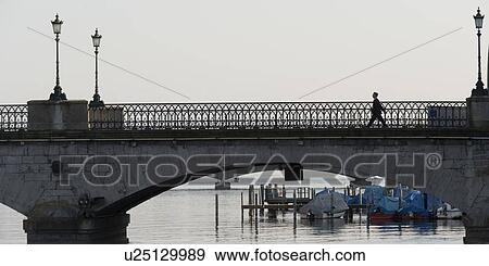 Bridge across a river, Bahnhofstrasse, Zurich, Switzerland View Large Photo Image Stock Photo - Bridge across a river, Bahnhofstrasse, Zurich, Switzerland. Fotosearch