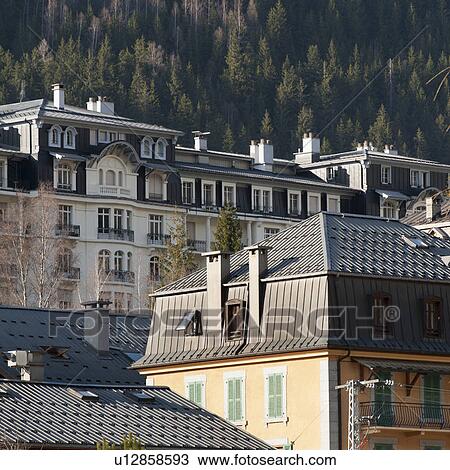 Stock Image - Buildings in a village in the valley, Chamonix, Rhone-Alpes, France. Fotosearch