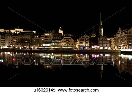 Buildings lit up at night, District 1, Zurich, Switzerland View Large Photo Image Stock Photography - Buildings lit up at night, District 1, Zurich, Switzerland. Fotosearch