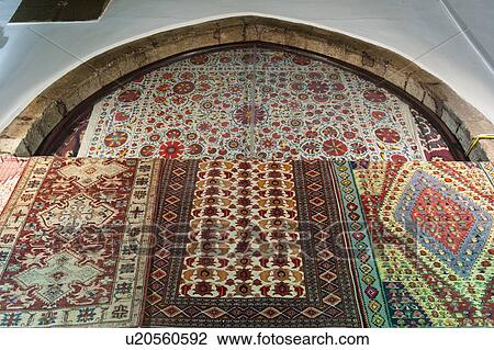 Stock Image - Carpets at a store in Grand Bazaar, Istanbul, Turkey. Fotosearch