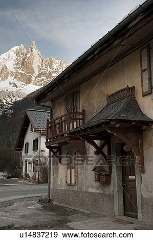 Chalets in Les Praz with the Aiguille Du Dru mountain in the background, Chamonix, Rhone-Alpes, France View Large Photo Image Stock Photo - Chalets in Les Praz with the Aiguille Du Dru mountain in the background, Chamonix, Rhone-Alpes, France. Fotosearch