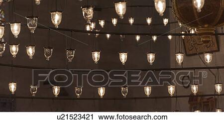 Stock Image - Chandelier Lights in Suleymaniye Mosque, Third Hill, Istanbul, Turkey. Fotosearch