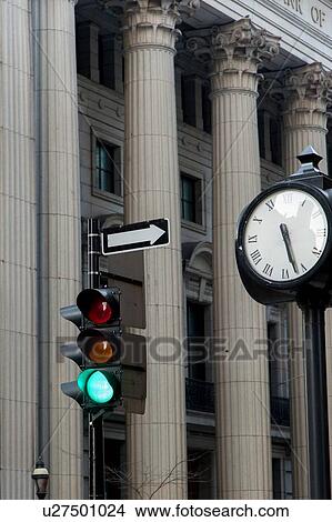 Clock post near traffic lights in a city, Ville-Marie, Montreal, Quebec, Canada View Large Photo Image Picture - Clock post near traffic lights in a city, Ville-Marie, Montreal, Quebec, Canada. Fotosearch
