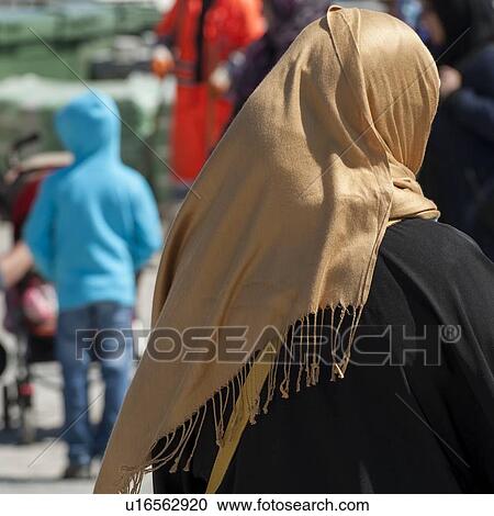 Close-up of a woman in traditional clothing, Istanbul, Turkey View Large Photo Image Stock Image - Close-up of a woman in traditional clothing, Istanbul, Turkey. Fotosearch