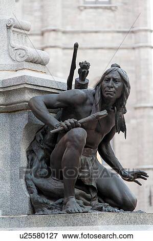 Stock Photo - Close-up of an aboriginal man's statue, Maisonneuve Monument, Place d'Armes, Ville-Marie, Montreal, Quebec, Canada. Fotosearch