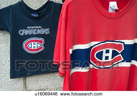Close-up of souvenir t-shirts for sale, Ville-Marie, Montreal, Quebec, Canada View Large Photo Image Stock Photograph - Close-up of souvenir t-shirts for sale, Ville-Marie, Montreal, Quebec, Canada. Fotosearch