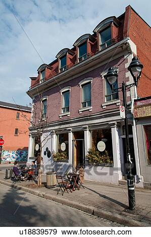Stock Photo - Facade of a sidewalk cafe, Mile-End, Montreal, Quebec, Canada. Fotosearch